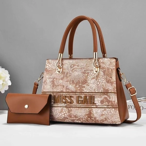 Floral embroidered tote bag with matching pouch and adjustable shoulder strap in earth brown