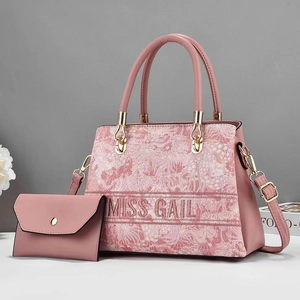 Pink floral embroidered tote bag set with matching clutch and gold chain handles