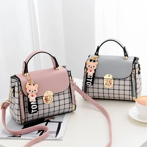 Chic pink and grey plaid crossbody bags with cute bear charm and metal buckle