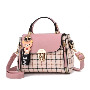 Pink and plaid crossbody handbag with gold lock and cute bear charm accessories