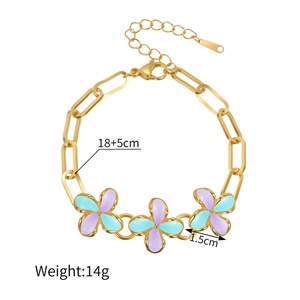 Detail view of 18k gold plated flower bracelet with enamel charms and size markings