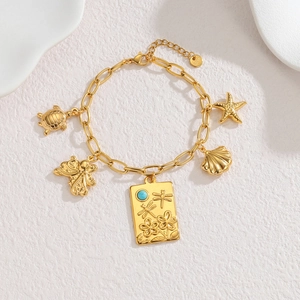 Bracelet doré en acier inoxydable 18k avec breloques océaniques, turquoise et coquillages