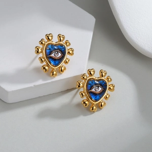 18K gold heart-shaped stud earrings featuring a blue evil eye enamel center on white stone