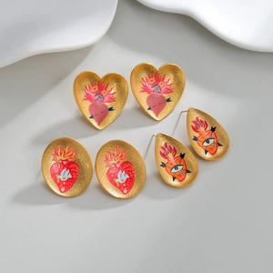 Boucles d'oreilles vintage en plaqué or 18k avec motifs cœur et œil en émail rouge