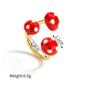Detail view of golden mushroom ring showing 1.8cm diameter and 1.1cm mushroom head size