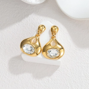 Boucles d'oreilles vintage en forme de goutte d'or avec cristaux et pierre œil de chat