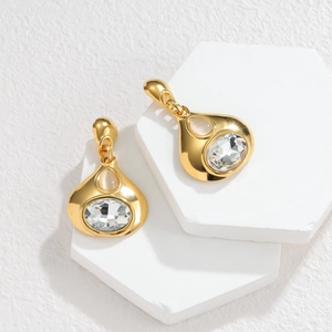 Boucles d'oreilles vintage dorées en forme de goutte avec cristal et pierre œil-de-chat