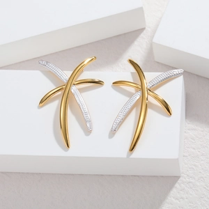 Elegant 18k gold and silver crisscross stud earrings with unique star-shaped metal design