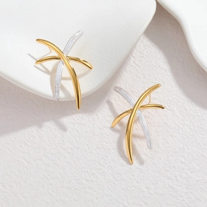 Elegant 18k gold and silver two-tone crisscross stud earrings with frosted metal texture