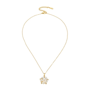 Gold chain necklace with white floral pendant and zircons on white background