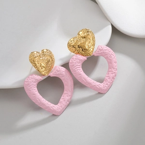 Pink hollow heart earrings with 18k gold plating and hammered texture in a romantic style