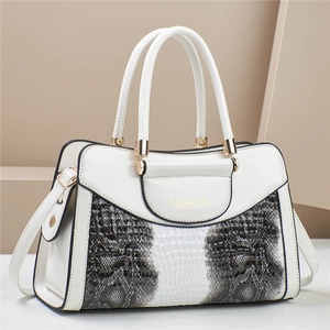 White glossy faux leather handbag with crocodile pattern details and gold-tone hardware