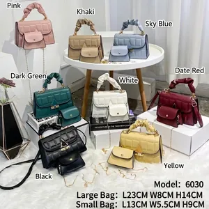 Fashionable two-piece handbag set with embossed texture and metal triangle buckle