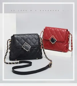 Close-up of quilted PU leather texture and metal chain straps on elegant shoulder bags