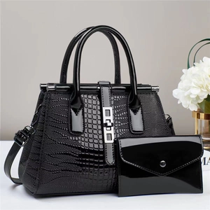 Elegantes 2-teiliges Set aus schwarzer Handtasche mit Krokoprägung und Schultergurt
