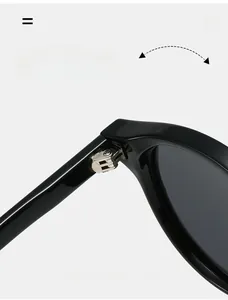 Detailansicht der silbernen Metallscharniere und des schwarzen Rahmens der Sonnenbrille