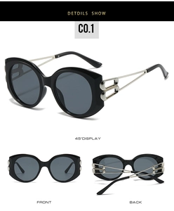 Detailed views of oval sunglasses with black frames and silver镂空 branched temples
