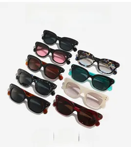 Collection of cat eye sunglasses featuring various tortoiseshell patterns and metal rivets