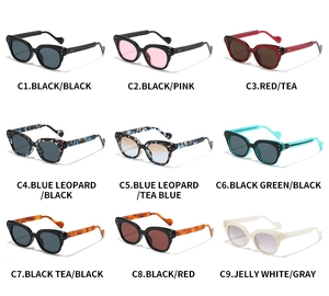 Nine stylish cat-eye sunglasses in various colors displayed in a 3x3 grid layout
