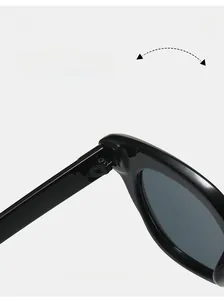 Detail of durable texture hinge on black cat eye sunglasses with metallic joint