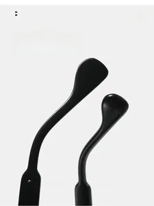 Detail of curved ergonomic black temple legs for comfortable wear on summer cat-eye sunglasses