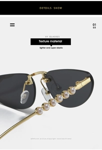 Detail of gold metal temples with white pearls on rimless cat-eye sunglasses