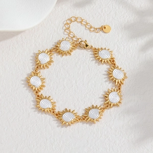 18k gold plated stainless steel daisy bracelet with white enamel and sun charms