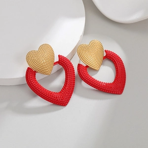Fashionable 18k gold layered heart stud earrings with red hollow textured design
