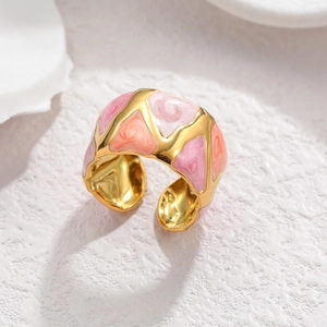 Adjustable golden stainless steel ring with pink and orange marbled enamel finish