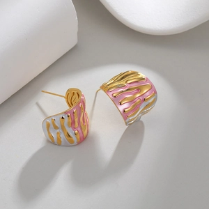 Irregular tricolor C-shape earrings with gold, silver and pink textured enamel finish
