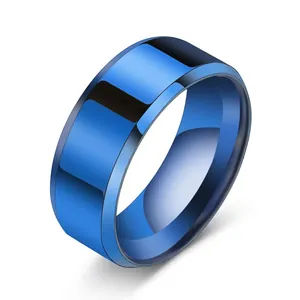 Close-up of a minimalist royal blue stainless steel ring with a polished mirror finish