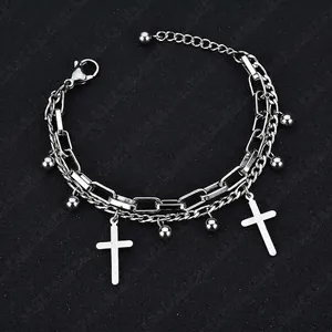 Silver double-layer cross pendant bracelet with paperclip chain and lobster clasp closure