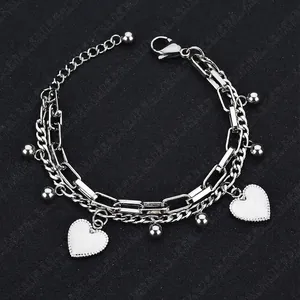 Double-layer stainless steel chain bracelet featuring white heart charms and silver beads
