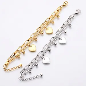 Double-layered stainless steel heart charm bracelet set in gold and silver finishes
