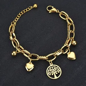 Bracelet double couche en acier plaqué or 18k avec pendentifs arbre de vie et cœurs