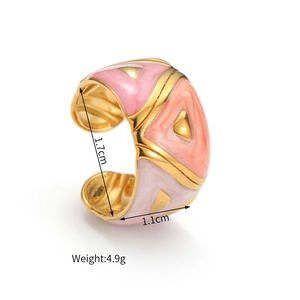 Detail view of irregular geometric ring with colorful enamel inlay and dimension labels