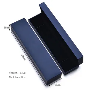 Detailed view of open and closed long blue necklace jewelry gift boxes with black flocking
