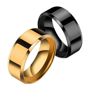 Polished minimalist stainless steel rings set in gold and black with beveled edges