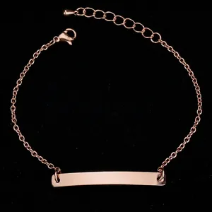 Rose gold stainless steel chain bracelet with a polished engravable curved bar and lobster clasp