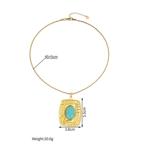 Detail of vintage 18k gold turquoise pendant showing dimensions 5.5cm by 3.8cm and chain