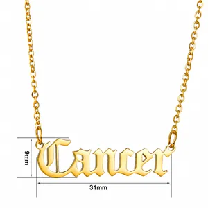 Detailed view of Cancer zodiac pendant in gold finish with 31mm x 9mm dimensions