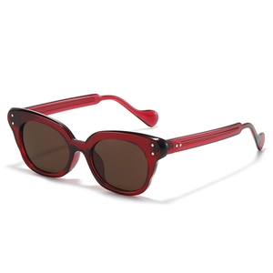 Retro cat-eye sunglasses with dark red acetate frame and silver metal accents