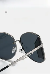 Detail of lightweight metal sunglasses frame showing flexible temples and texture