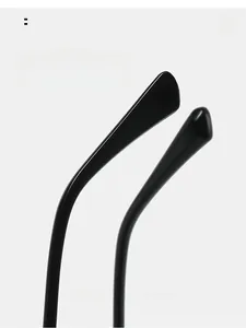 Detail view of glossy black curved temple tips for comfortable ergonomic eyewear fit