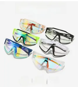 Flat lay of multiple sports cycling sunglasses in various colors with wrap-around frames