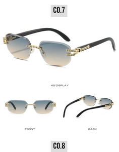 Detail of rimless square sunglasses with blue-orange gradient lenses and diamond accents