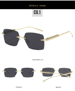Detail view of rimless square sunglasses with textured gold metal temples in 45-degree angle