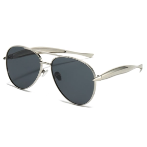Classic pilot sunglasses with silver metal frame and dark lenses on white background