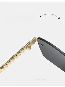 Detail of durable textured golden metal hinges on rimless square sunglasses