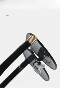 Detail of high-quality hinges and soft silicone nose pads on black double-bridge sunglasses